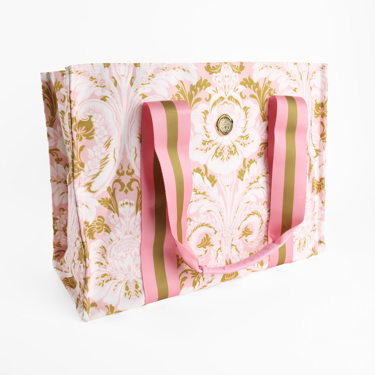Pink Damask Tote Bag featuring a pink and gold floral pattern on canvas with wide, matching pink and gold striped handles, displayed on a white background.