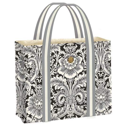 The Damask Noire Tote Bag features a black and white floral design, gray handles, and a beige interior.