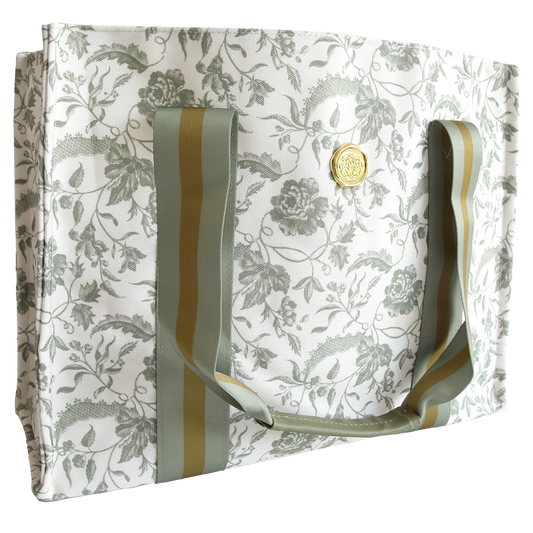 The Green Climbing Rose Tote Bag features a rectangular shape, green floral pattern, green and gold striped handles, a round gold front emblem, and a zippered pocket, all displayed on a white background.