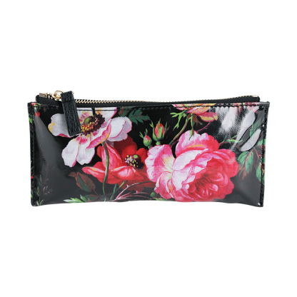 The Noire Pencil Case is a rectangular black zippered pencil pouch with a glossy finish, showcasing a vibrant pink floral pattern on the front. Crafted from laminated cotton for enhanced durability and easy cleaning, this stylish desk accessory adds flair to your workspace.