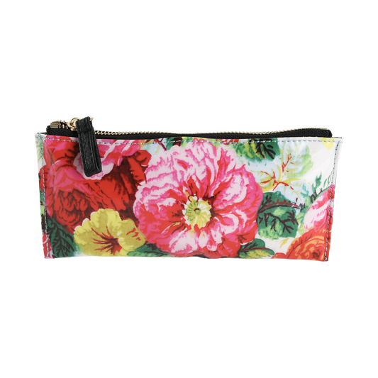 The Annalise Pencil Case is a rectangular zippered pouch adorned with a vibrant floral pattern showcasing large pink, red, and yellow flowers on a crisp white background. Ideal for organizing your essentials, this stylish pencil case also makes a thoughtful gift for women who love fashionable accessories.
