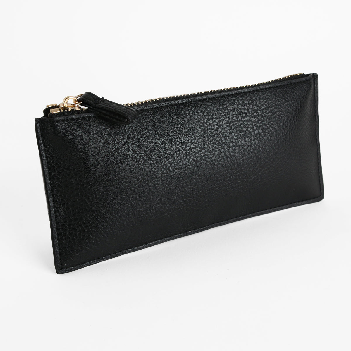 The Onyx Black Pencil Case, a rectangular black zippered pouch for women, is displayed on a white background. Crafted from high-quality faux leather, this stylish and functional pencil case is perfect for everyday organization.