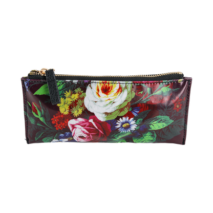 The Astrid Pencil Case is a rectangular zippered pouch with a vibrant botanical print featuring roses, daisies, and green leaves on a dark background—perfect as a floral pencil case or stylish organizer.