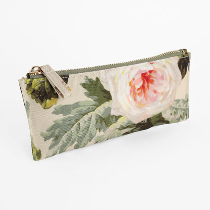 The Francesca Pencil Case is a rectangular zippered pouch featuring a charming botanical print with a large pink and white flower and green leaves on a beige background—perfect for organizing your essentials.