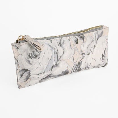 Faded Rose Pencil Case — a rectangular zippered pouch featuring a sophisticated floral pattern in shades of grey and white, displayed on a clean white background. This elegant case is an ideal gift for writers or anyone who values stylish organization.
