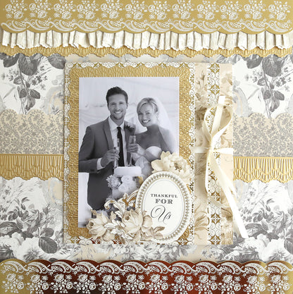 A decorative wedding card with a black and white photograph of a smiling couple holding drinks. The card features ornate gold and floral patterns, Faded Rose Papers and Embellishments, and the text "Thankful For Us" on the front.