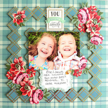 Two children are smiling in front of an Anna Griffin Fall Plaid Cardstock frame, dressed in flannel shirts.