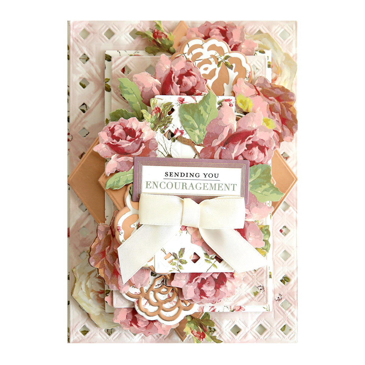 A decorative card with layered pink flowers, a white bow, and a message that reads "Sending You Encouragement" on a patterned background.