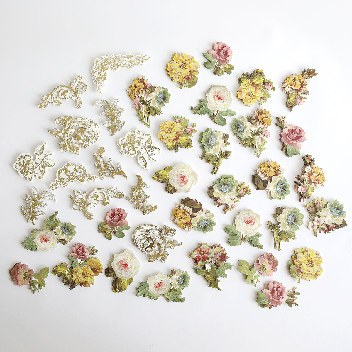 Francesca Embellishments, featuring dimensional floral stickers and ornate gold designs, are artfully arranged as assorted decorative paper cutouts on a white background.