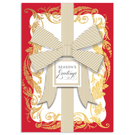 Season's Greetings card from the Gold Bow Red Boxed Card 10ct. collection, featuring an ornate gold and red floral design with a striped bow and central text. Handmade with specialty finishes for added elegance.