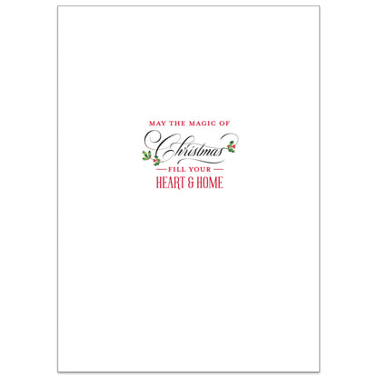 Discover the Merry Santa Boxed Card 10 count, exquisitely handmade with the heartfelt message "May the magic of Christmas fill your heart & home." Each card is adorned with charming small holly decorations and enhanced with specialty finishes for an added touch of elegance.