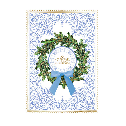 The Blue Bow Wreath Boxed Card 10ct features a green wreath with a blue bow and "Merry Christmas" in gold script, gold foil accents, blue patterns, and a gold border on a white background.