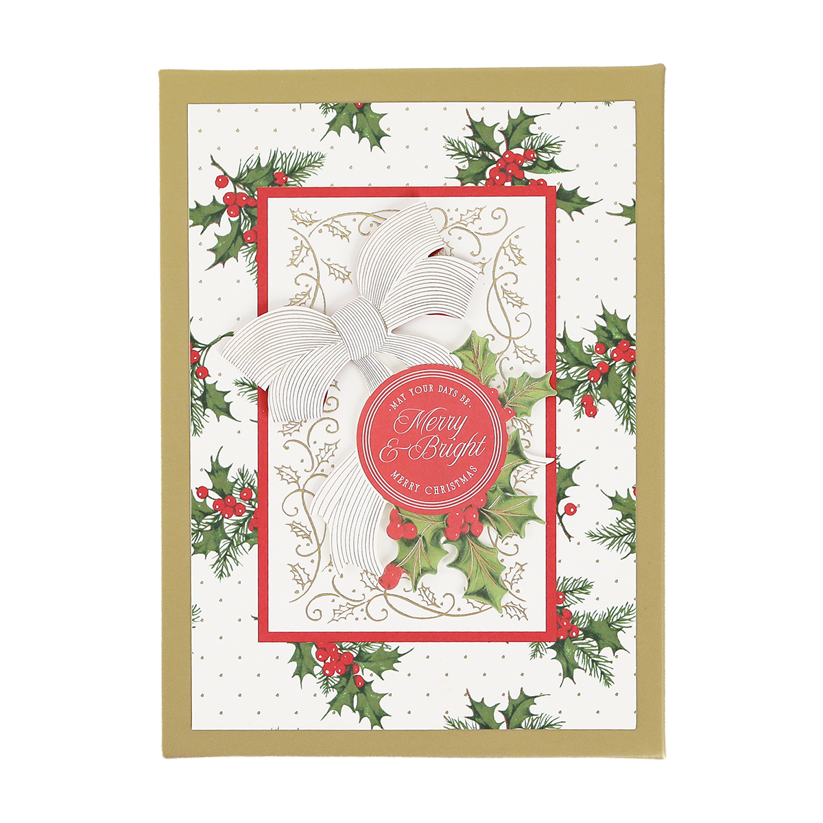 Elevate your holiday card collection with the Heirloom Holly Boxed Cards 10 ct, featuring a stunning design with a gold border, festive holly decorations, a white and gold bow, and a red circle that reads “Merry & Bright.” The elegant background is adorned with small gold dots for an extra festive touch.