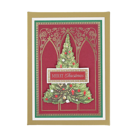 A set of Cathedral Christmas Tree Boxed Cards (10 count), featuring a decorated tree and the words “Merry Christmas” on an elegant red and gold ornate background.