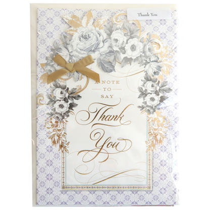 The Handmade Card Assortment features decorative handmade cards with gold script, floral designs, and a gold ribbon, each displaying the words "A Note to Say Thank You" on the front.