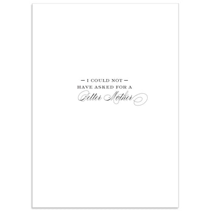 The Camilla Happy Mother's Day Card is a 5" x 7" card featuring the text "I could not have asked for a better mother" in elegant fonts on a white background, enhanced with shimmering gold foil accents, and comes with a printed lined envelope.