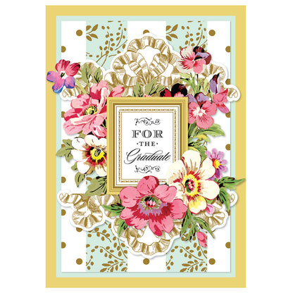 The Amelie For The Graduate Card showcases pink and white blooms surrounding gold ornate "For The Gratitude" text. A green and white striped background with gold dots enhances the design, paired with a matching printed lined envelope.