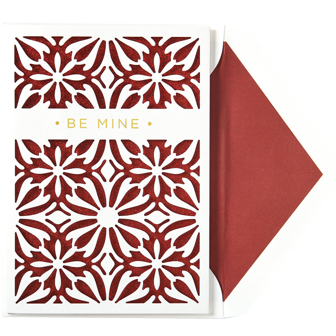 The Be Mine Laser Cut Single Card showcases intricate red floral cutouts and "Be Mine" in gold foil. It includes a matching printed lined envelope with the vibrant red design.