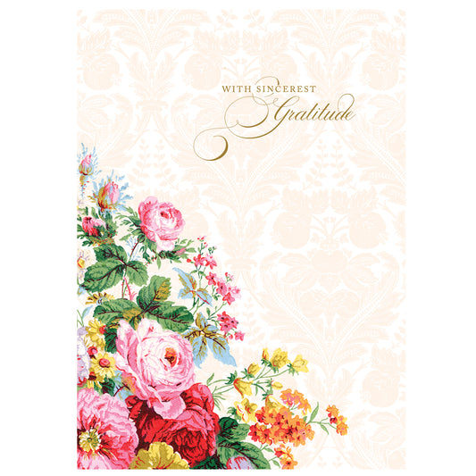 The Annalise Thank You Card features "With Sincerest Gratitude" text, adorned with pink, red, and yellow flowers on a beige patterned background highlighted by gold foil. It includes a lined envelope for an elegant touch.