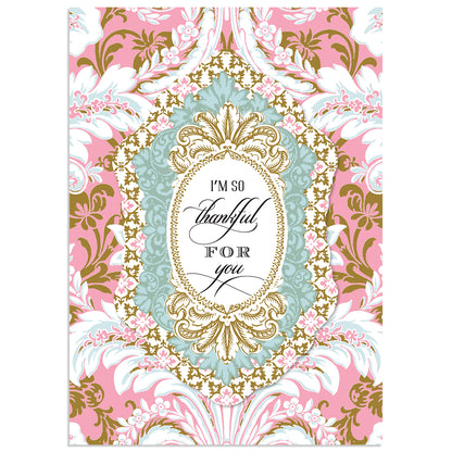 The Pink Damask So Thankful Card boasts ornate pink, blue, and gold floral patterns and the heartfelt message "I'm so thankful for you" at its center. It comes with a lined envelope, adding an elegant touch.