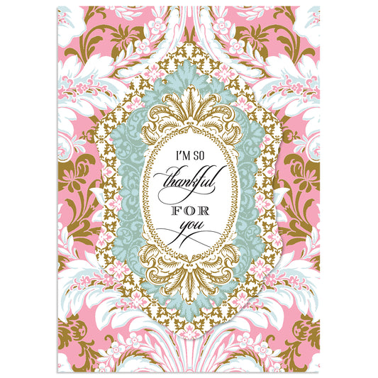 The Pink Damask So Thankful Card boasts ornate pink, blue, and gold floral patterns and the heartfelt message "I'm so thankful for you" at its center. It comes with a lined envelope, adding an elegant touch.