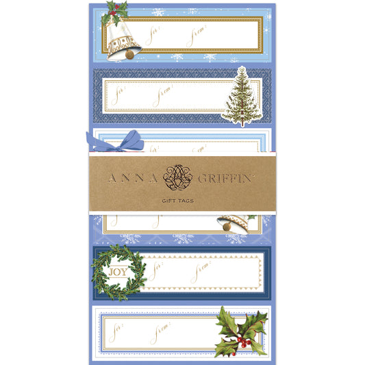 Blue Bells and Bows 3D Labels 24ct feature holiday gift tags with blue, gold foil, and white designs of bells, a tree, a wreath, and holly. Each tag includes "To:" and "From:" lines—ideal for festive gift wrapping.