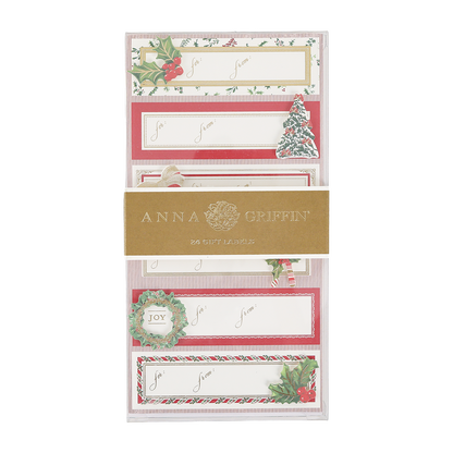 A package of Anna Griffin Joyful Gingham 3D Labels featuring festive designs such as holly, Christmas trees, gingham patterns, and “Joy” text. Perfect for holiday wrapping, the pack contains 24 labels.