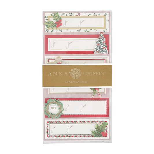 A package of Anna Griffin Joyful Gingham 3D Labels featuring festive designs such as holly, Christmas trees, gingham patterns, and “Joy” text. Perfect for holiday wrapping, the pack contains 24 labels.