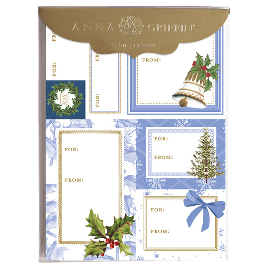 Blue Bells and Bows Labels 72ct features holiday gift tag stickers with motifs like wreaths, bells, trees, holly, and bows. Each label is accented with gold foil "For" and "From" text for a festive touch.