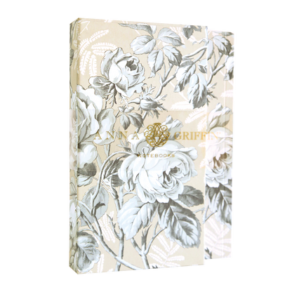 The Faded Rose Notebook Set features a beige and gray floral design with large white roses and green leaves. Branded "Anna Griffin" in gold foil, it offers lined pages for all your writing needs.