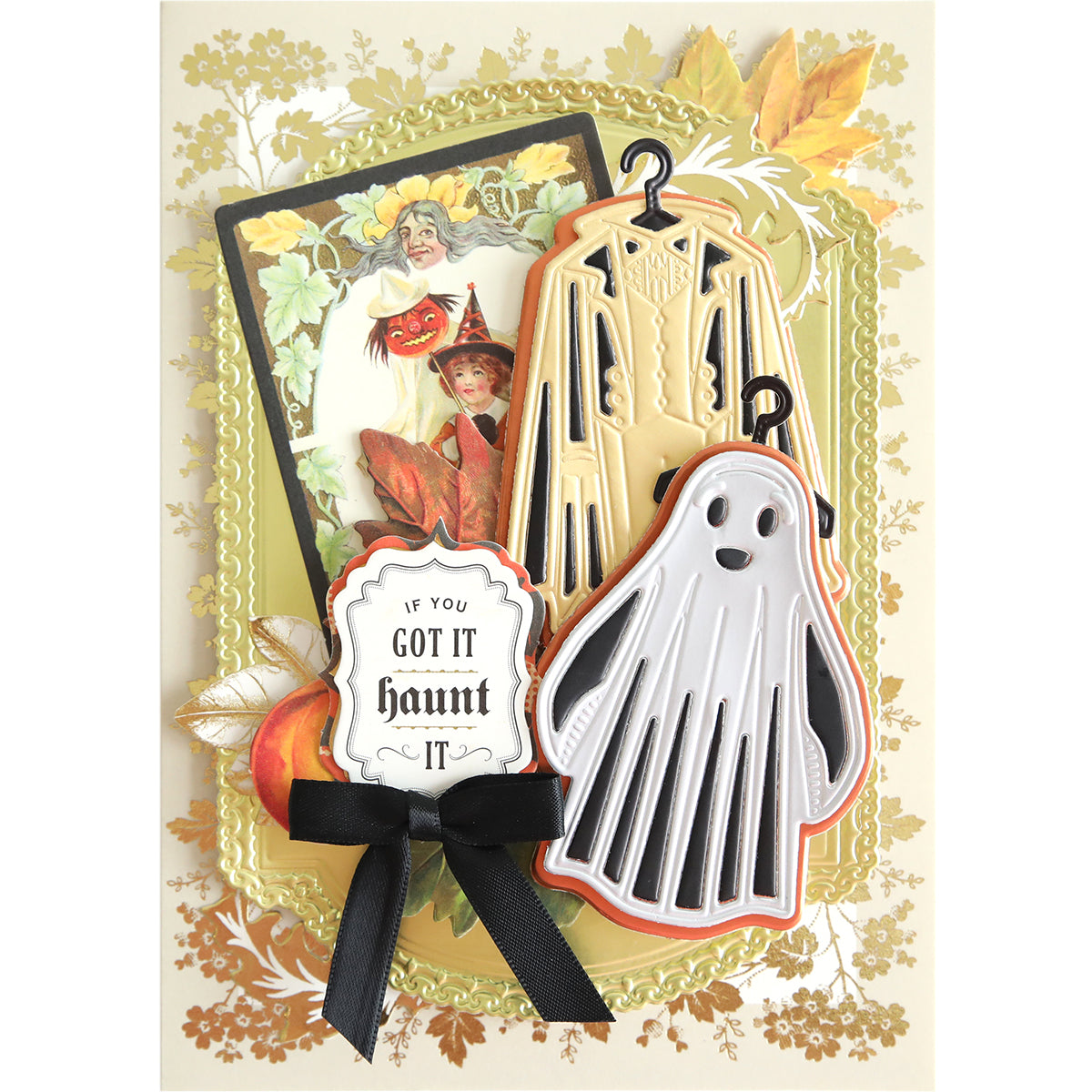 A Halloween-themed card featuring vintage illustrations of witches and ghosts, adorned with paper cutouts from the "Halloween Costume Dies" collection. The text on the card reads "If you got it, haunt it." These charming Halloween cards are perfect for sending spooky sentiments.