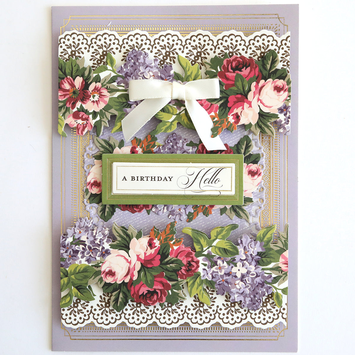 A birthday card featuring beautiful fall flowers, a white ribbon, and Harvest Border Stickers. The text on the card reads "A BIRTHDAY Hello.