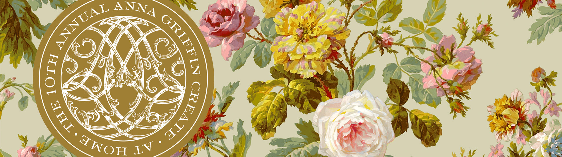 Floral pattern with pink, white, and yellow flowers next to a gold emblem containing decorative text “10th Annual Anna Griffin Create At Home.”.