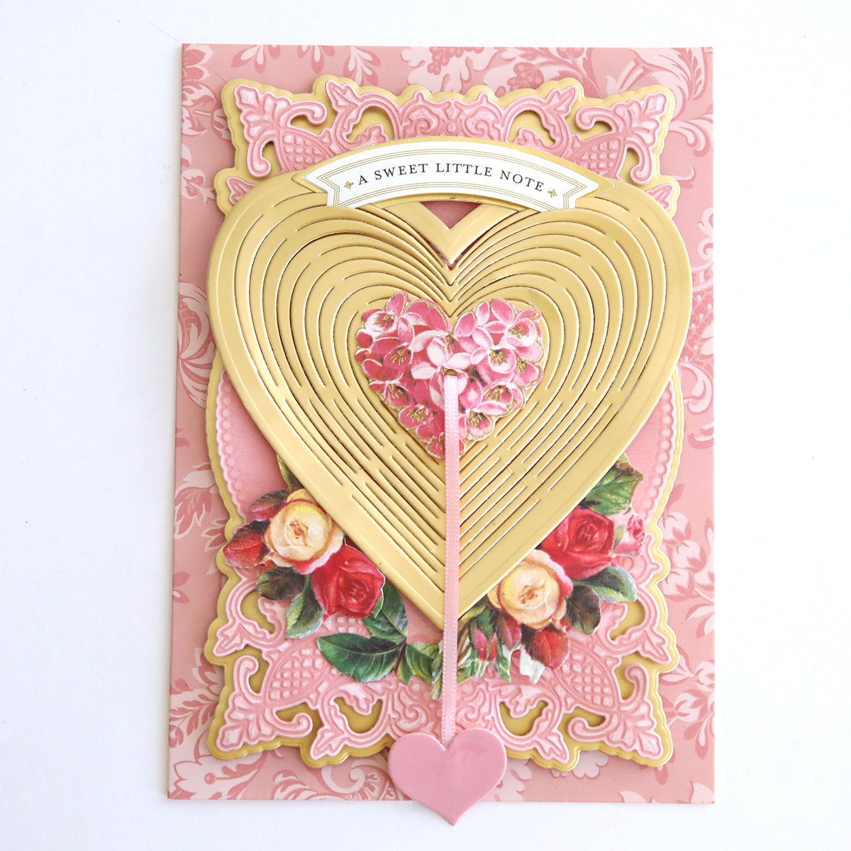 A delicate Heart Kirigami Dies with a gold heart and Japanese inspired roses.