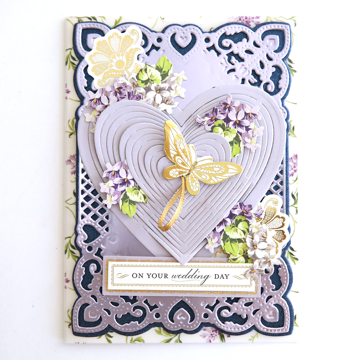 A Japanese-inspired wedding card featuring Heart Kirigami Dies adorned with delicate flowers.