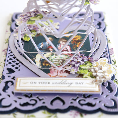 A Japanese inspired purple card featuring Heart Kirigami Dies and a picture of a wedding.