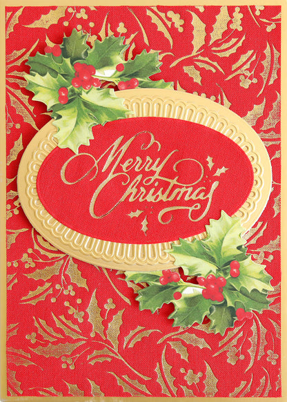 Holiday Fabric Card Layers feature a red and gold Christmas card design with "Merry Christmas" in elegant cursive, framed by holly leaves and berries, set against a festive decorative background—perfect for your Christmas card making projects.