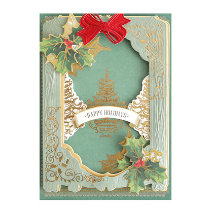 The Holiday Foil Rub On Transfers feature gold foil accents, holly details, a red bow, and a "Happy Holidays" banner on a festive green background.