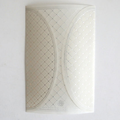 The Silver Foil Harlequin Gatefold 10 pack features white patterned envelopes with overlapping curved flaps and a subtle silver-gold diamond grid—ideal for elegant wedding invitations.