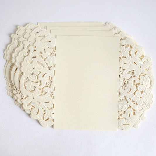 A 10 pack of Ivory Embossed Lace Gatefold invitations featuring intricate embossed lace and delicate floral borders, elegantly arranged on a white background.