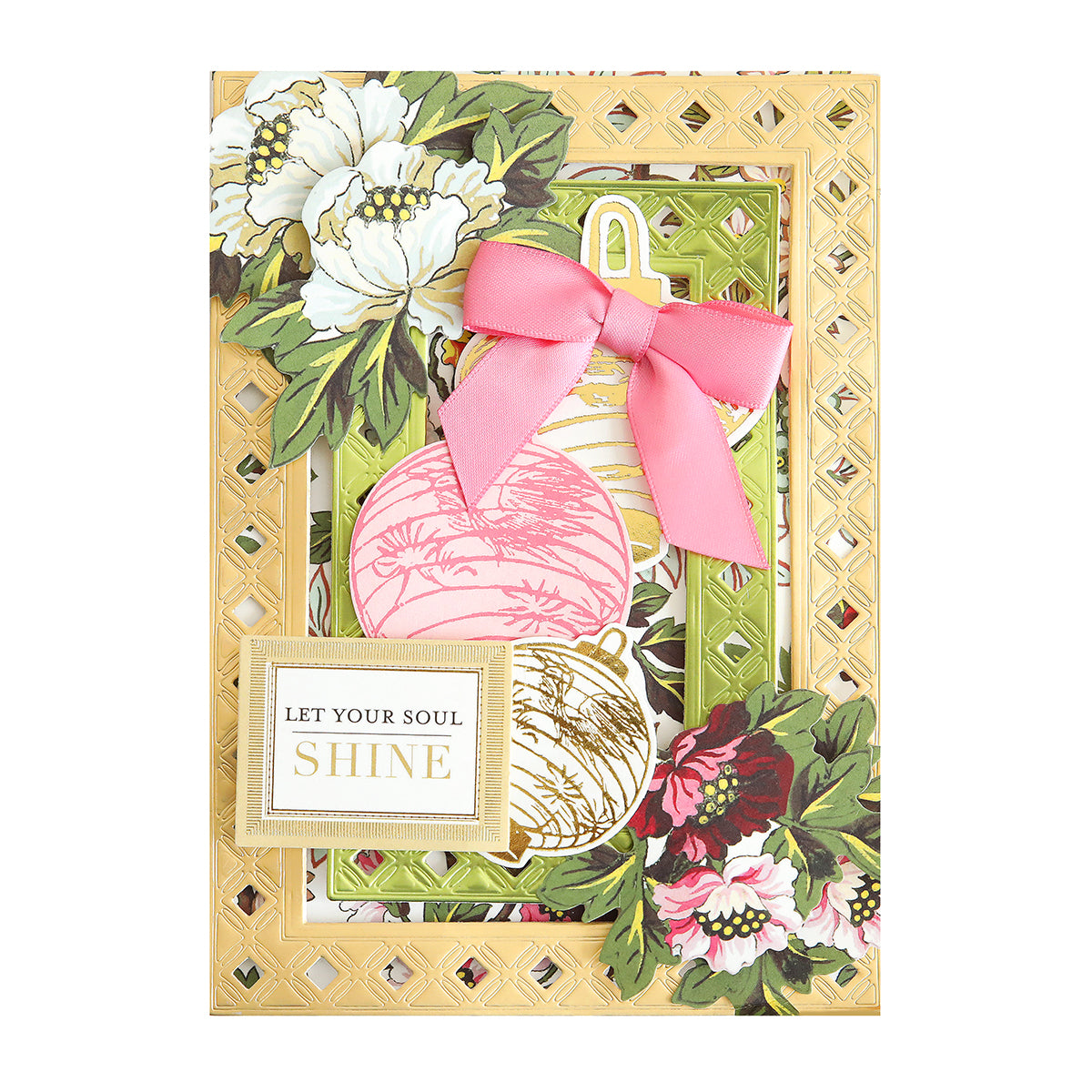 A decorative handmade card made with Crop at Home 5 Frame Dies features floral patterns, a pink bow, round ornaments, and a gold-bordered message that says "Let your soul shine.