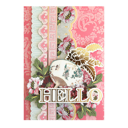 Lian Embellishments and Cards: A handmade card featuring pink floral designs, ornate trims, a paper fan illustration, bold gold-outlined "HELLO," and elegant details for a charming decorative touch.
