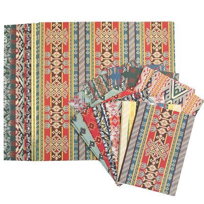 A set of Lomasi Cardstock Collection notebooks with a pattern on them.