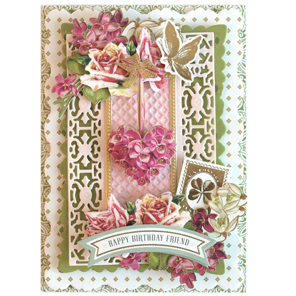 A birthday card made with Lucky for All Double Sided Cardstock features floral designs, a pink heart, butterflies, clover motifs, and "Happy Birthday Friend" on a layered gold foil background.