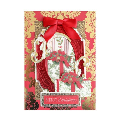 The Luxury Christmas Present Foil Cardstock features ornate gold and red patterns, a red bow, floral accents, gift boxes, and “Merry Christmas” text. Crafted from premium cardstock, it’s perfect for festive crafts.