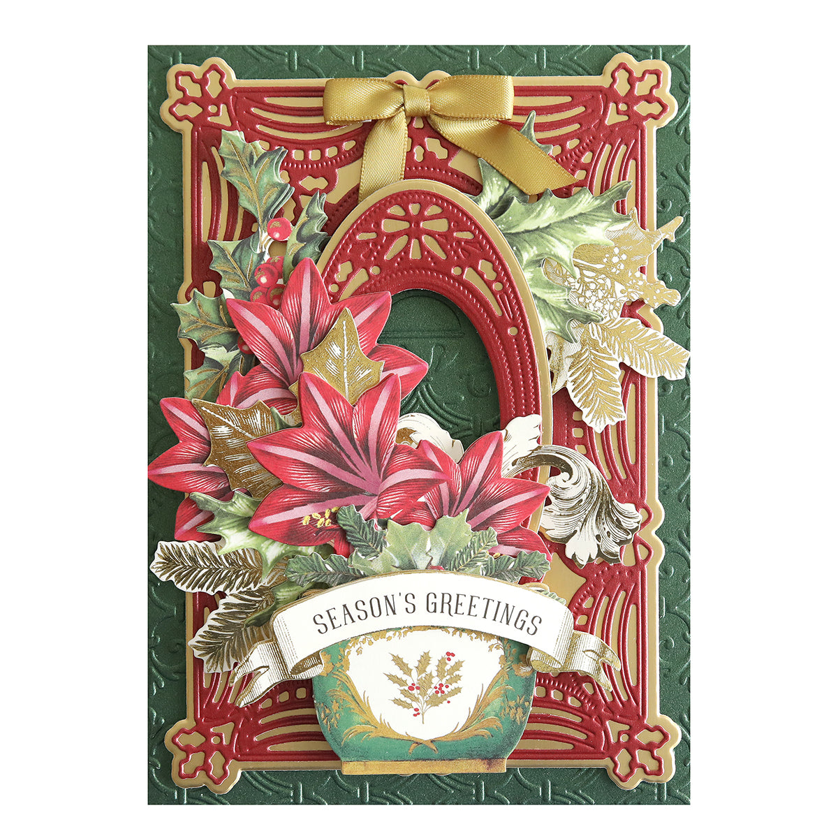 A festive greeting card crafted from Luxury Shimmer Cardstock - Holiday, adorned with red flowers, green leaves, golden accents, and a ribbon on top. The die-cut banner proudly displays "Season's Greetings.