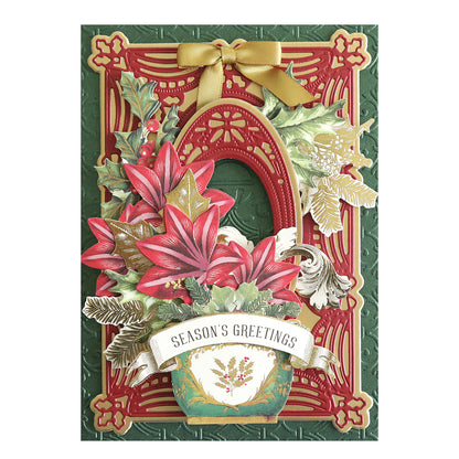 A festive greeting card crafted from Luxury Shimmer Cardstock - Holiday, adorned with red flowers, green leaves, golden accents, and a ribbon on top. The die-cut banner proudly displays "Season's Greetings.