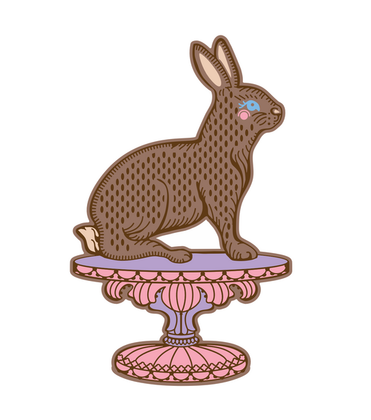 A rabbit sits on top of a pink pedestal, available exclusively for Members Only Patch February 2024.