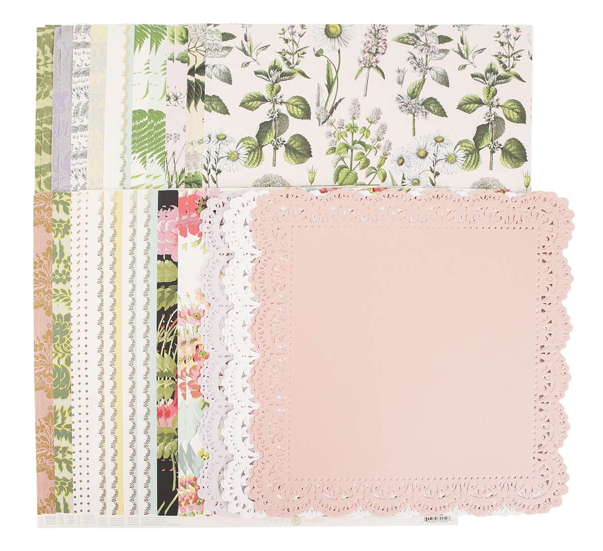 The Mystery Botanical 12x12 Cardstock features premium decorative sheets adorned with botanical prints, some with delicate lace-inspired edges, all neatly stacked—ideal for a variety of crafting projects.