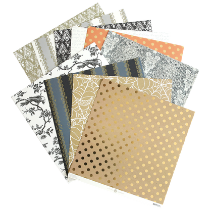 The Mystery Halloween 12x12 Cardstock set includes decorative sheets with floral, lace, polka dot, and spider web patterns in neutral and gold tones—perfect for Halloween crafting.